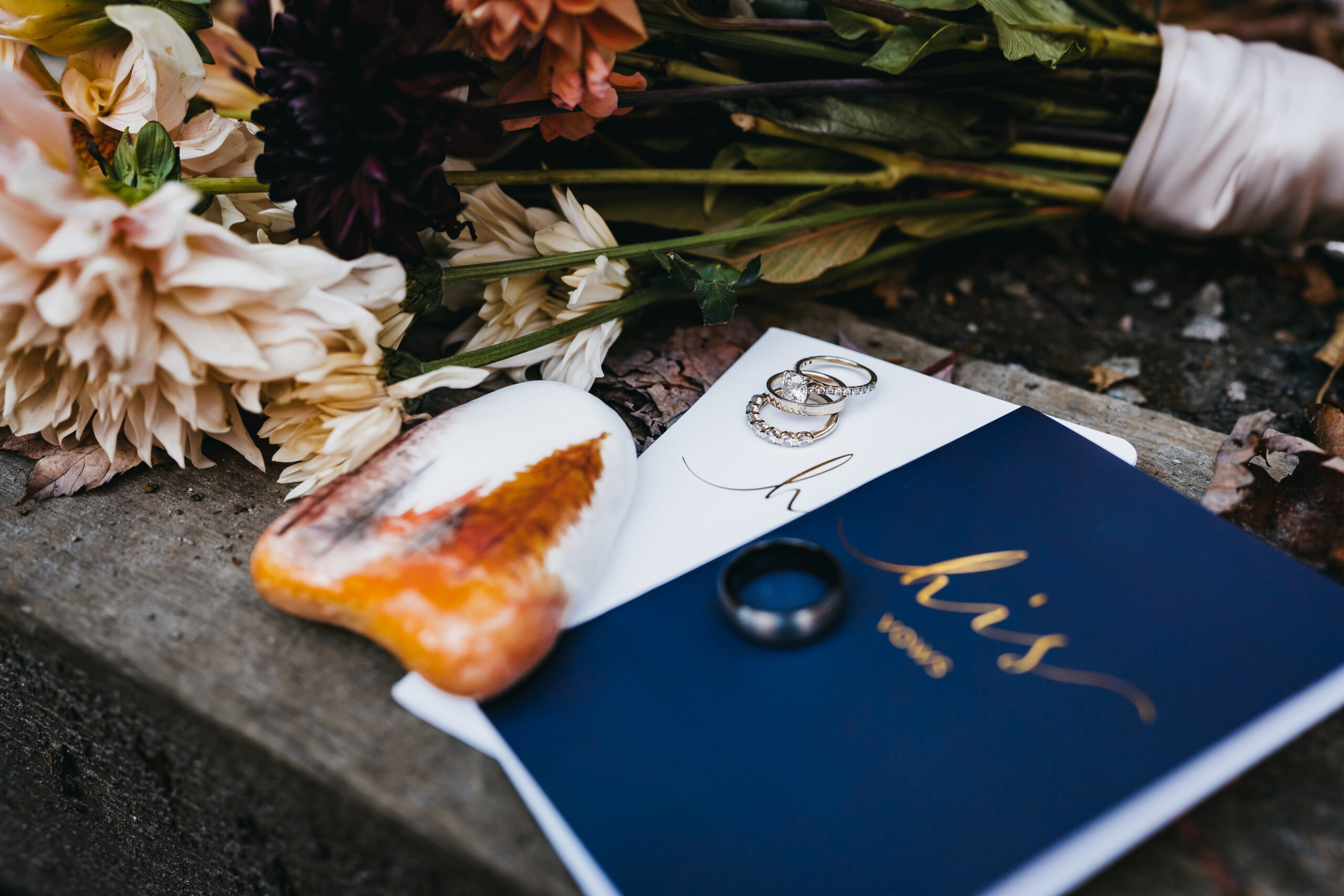 Wedding vow books and rings. 