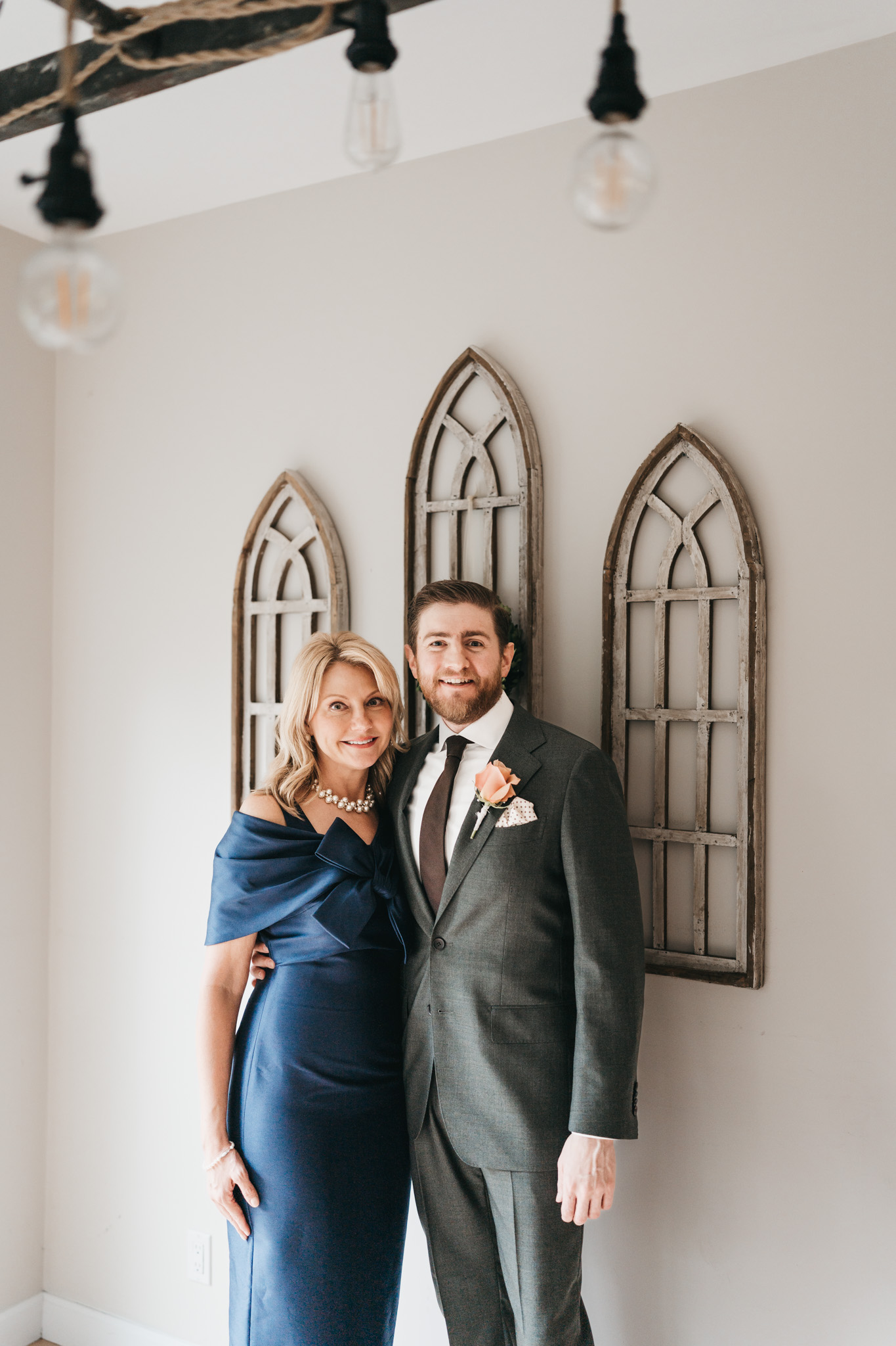 Groom getting ready photos with family