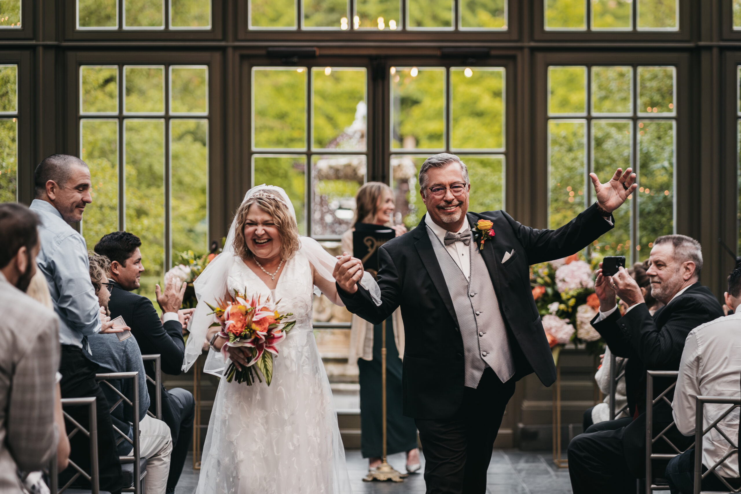 Intimate ceremony in the glass conservatory at the Park Royal Hotel.
