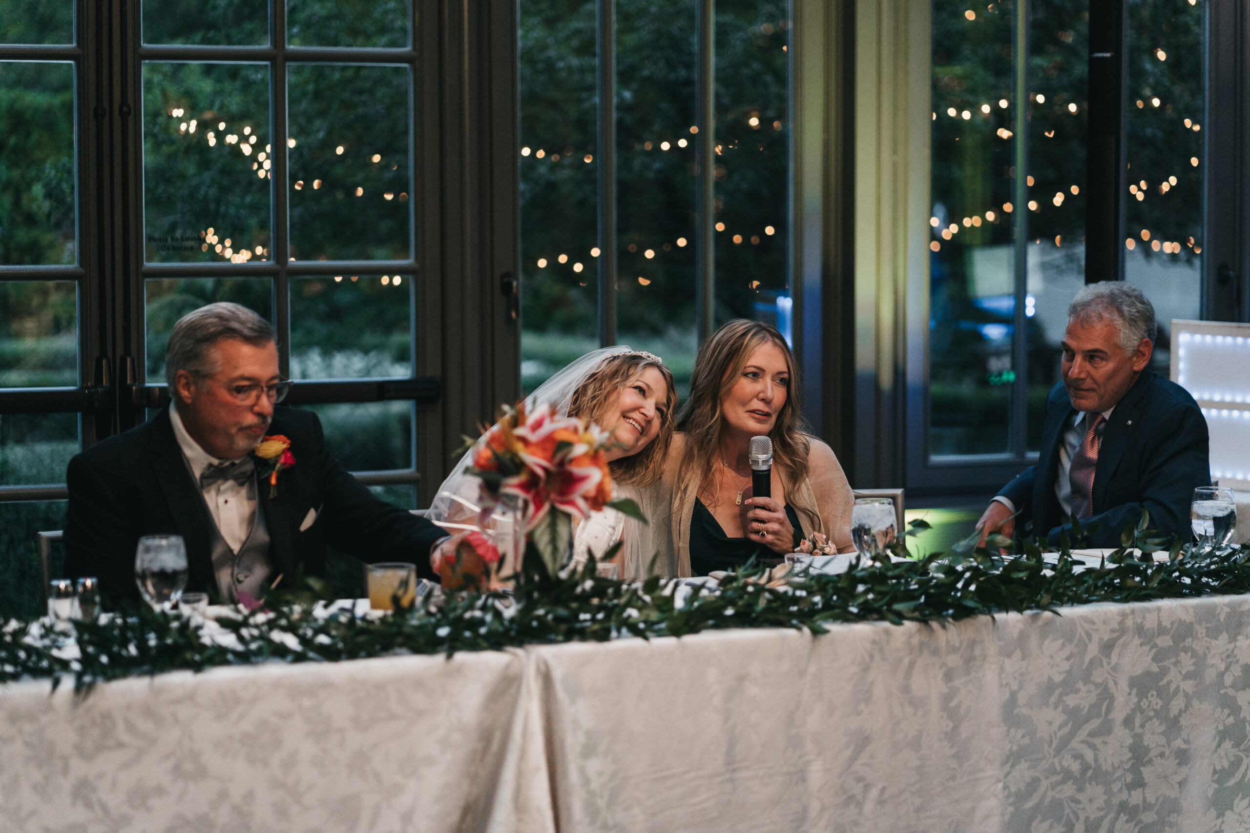Intimate moment during the speeches at the reception.