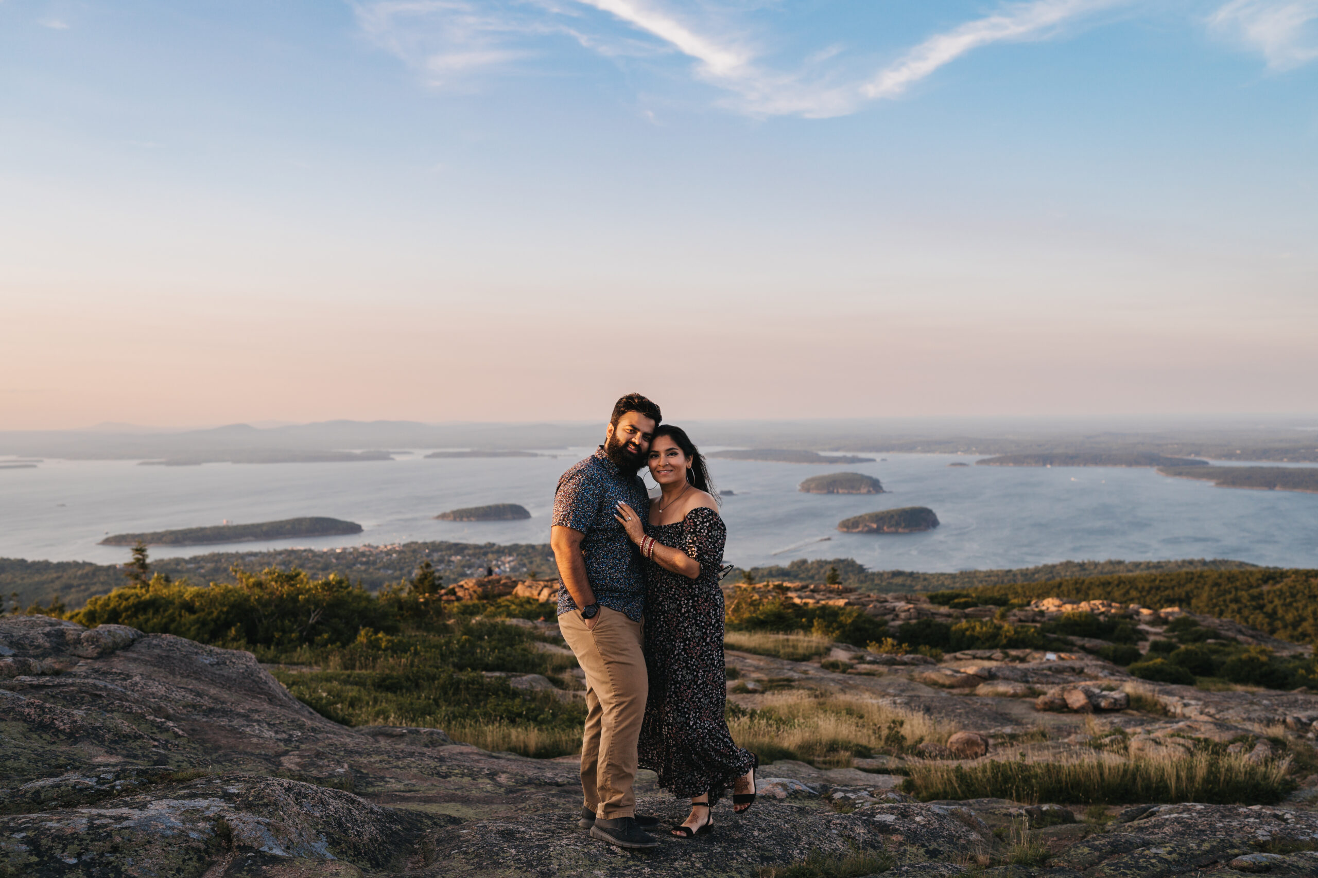 Playful couple portraits with panoramic mountain views