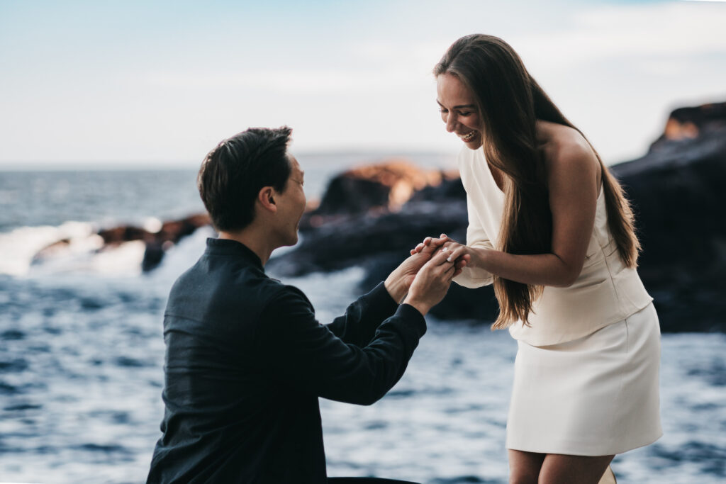 Nikki reacting to her surprise proposal in Acadia National Park