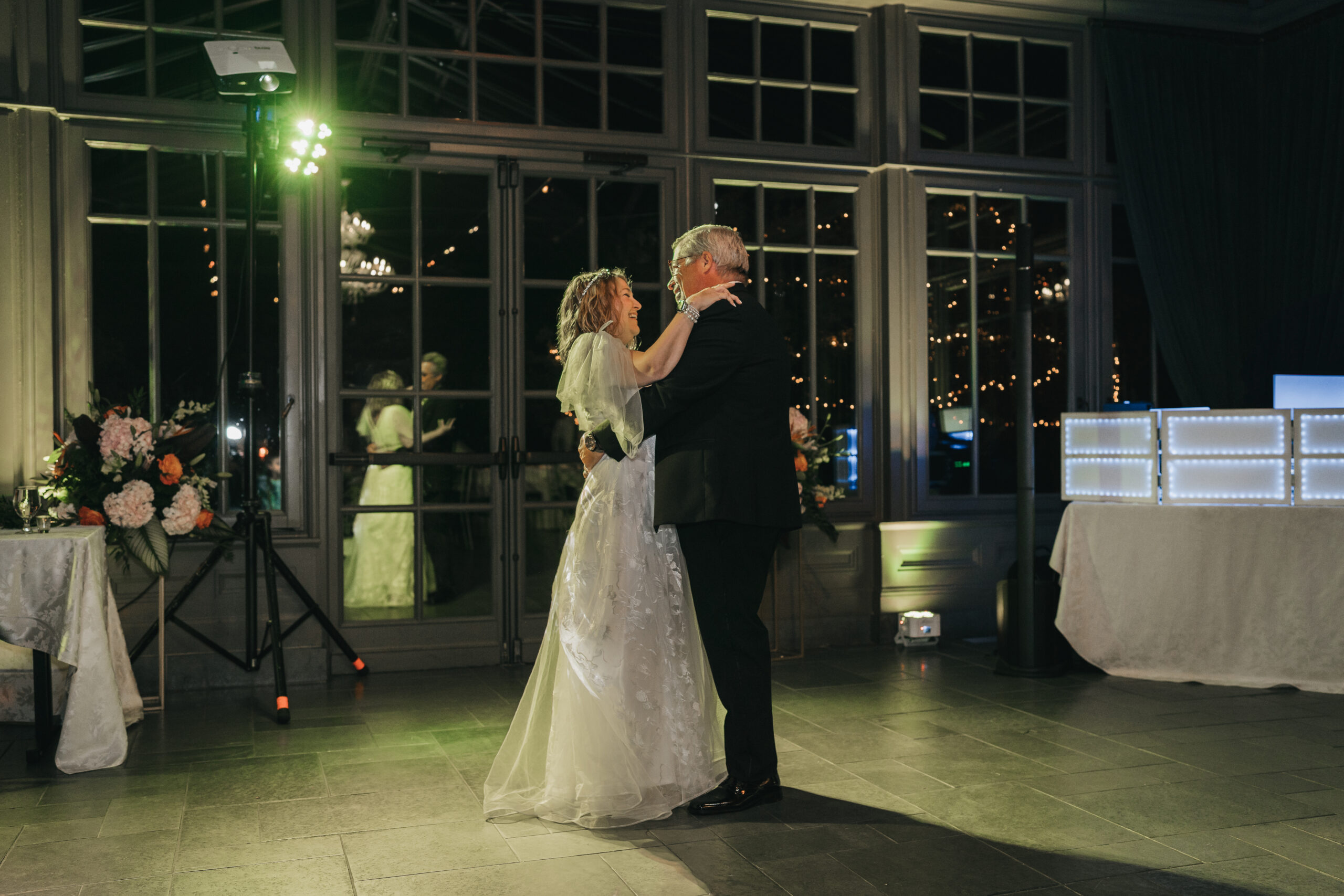 Ross and Jennifer sharing their first dance during their intimate Michigan wedding.