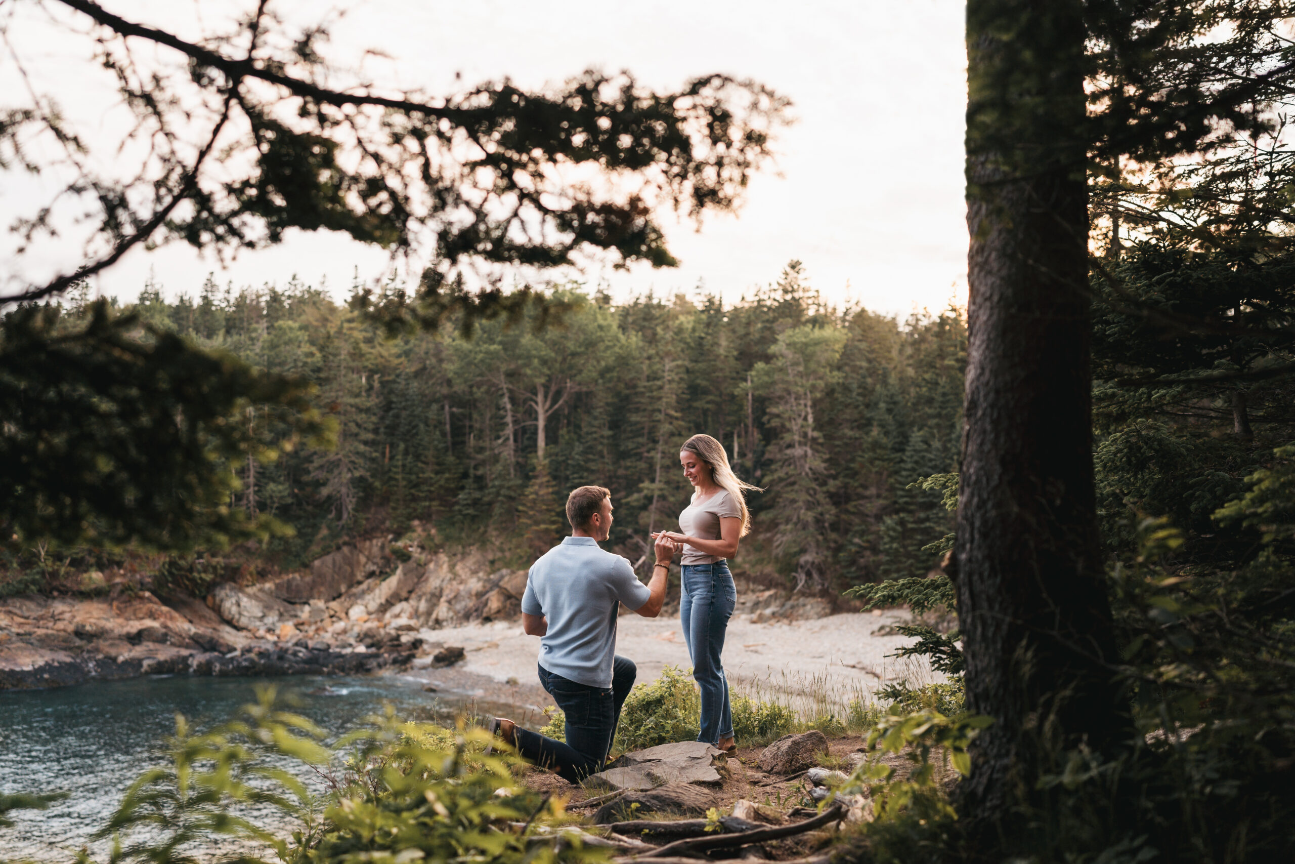 Romantic engagement photos along Acadia National Park rocky coast