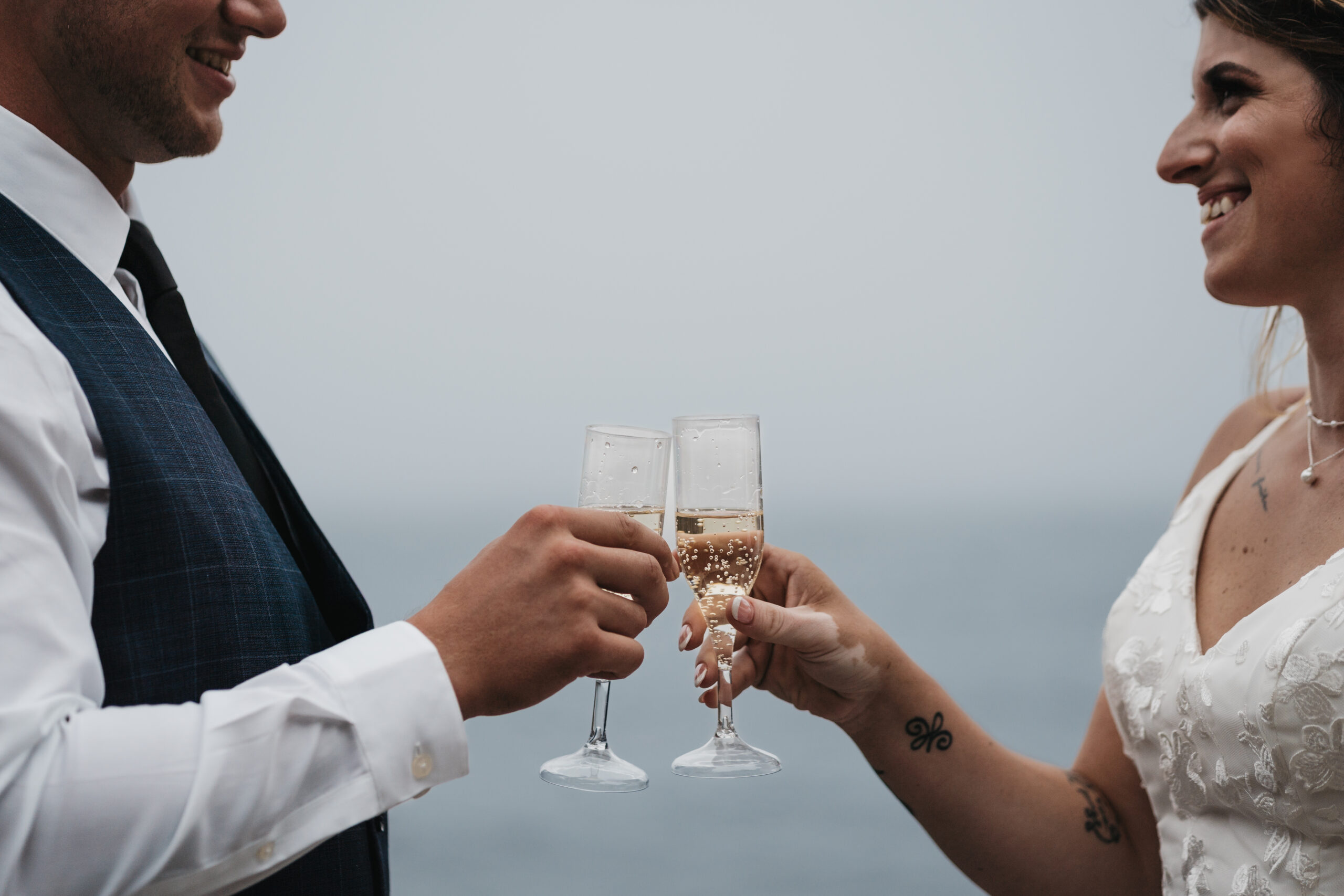 Newlyweds celebrating with champagne.