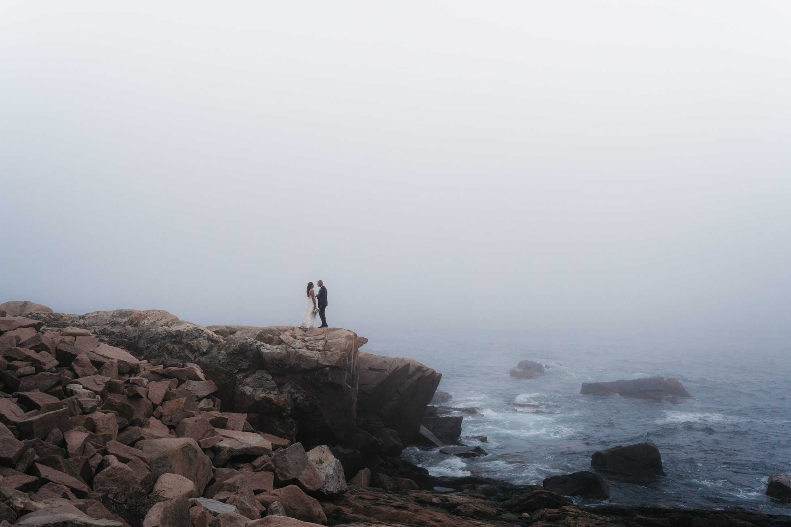Moody coastal wedding portraits from a romantic Maine Coastal elopement.
