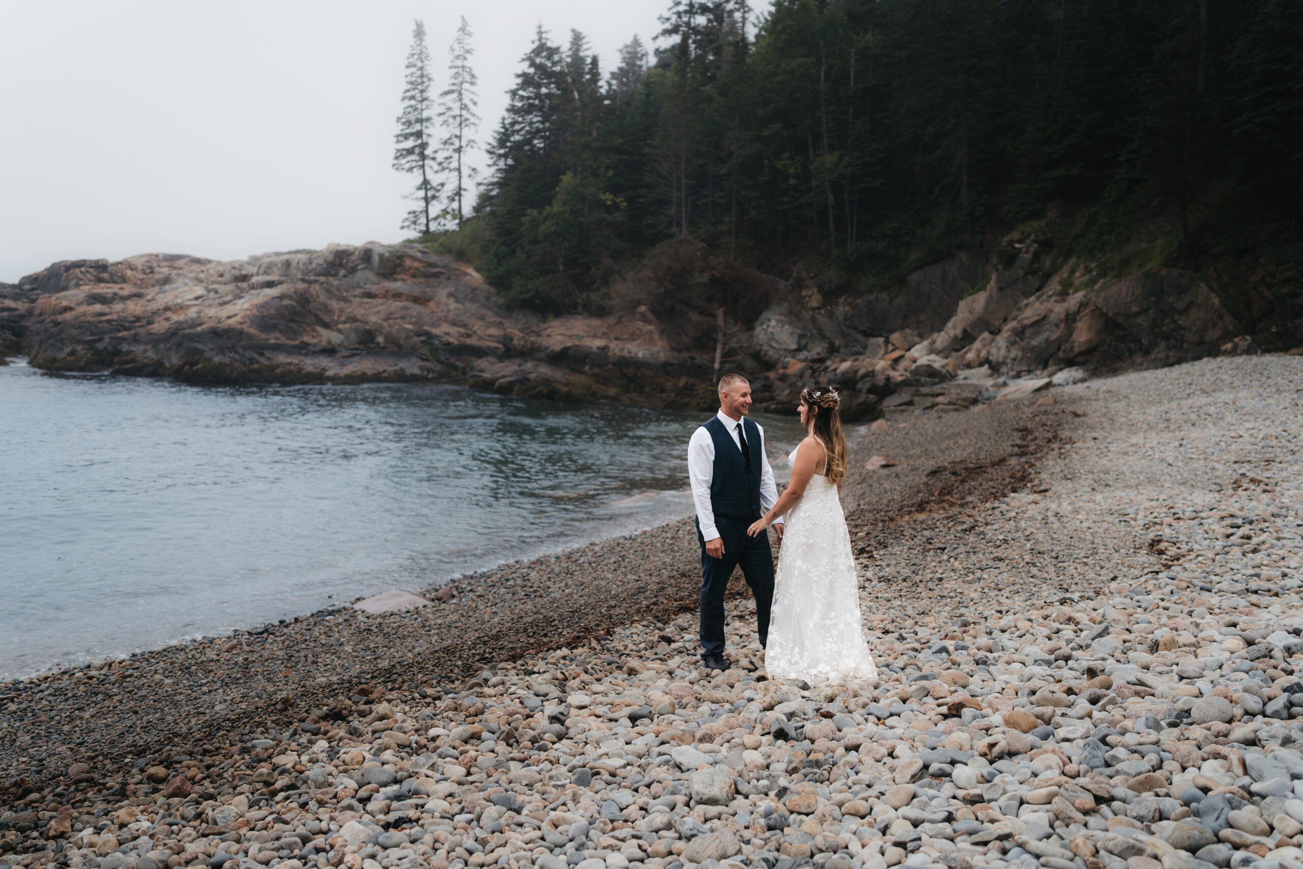 Intimate wedding ceremony at Little Hunters Beach during a romantic Maine Coastal elopement.