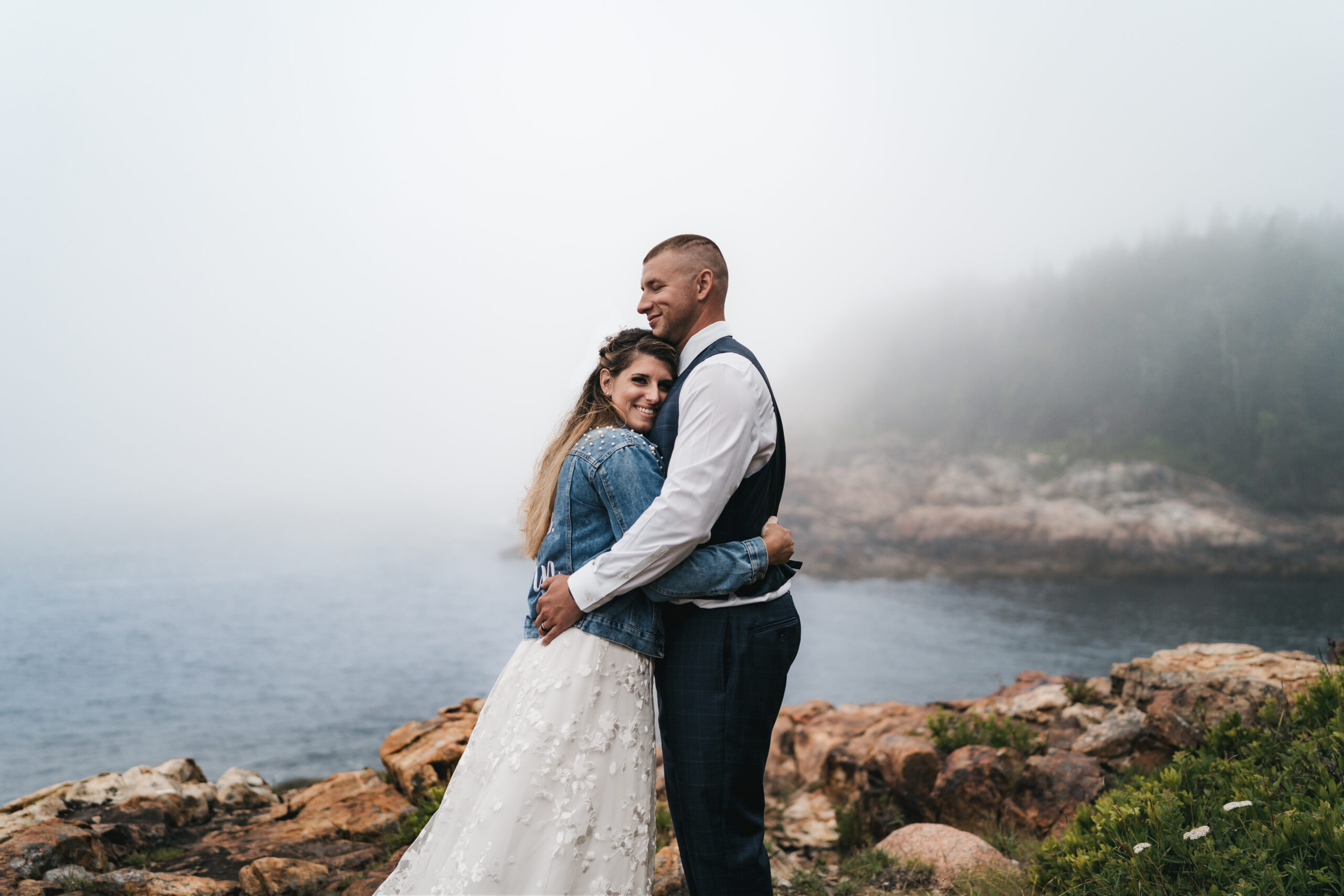 Bride embracing groom at Little hunter's Beach.
