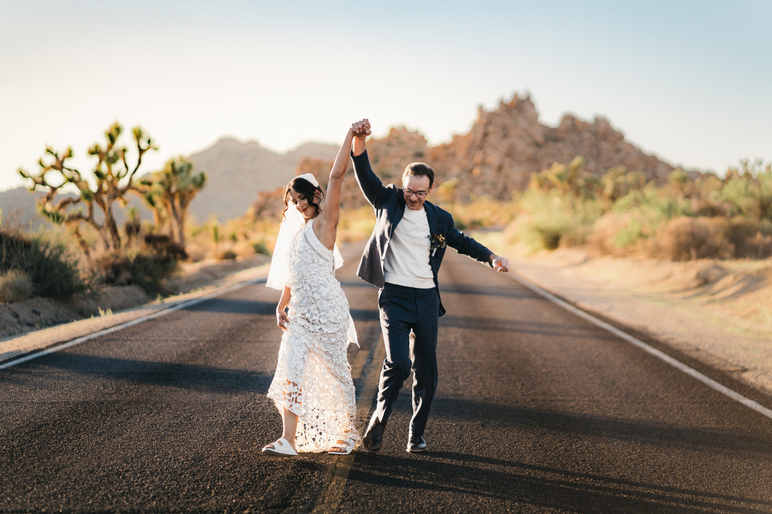Desert adventure wedding portraits from a beautiful Joshua Tree elopement.