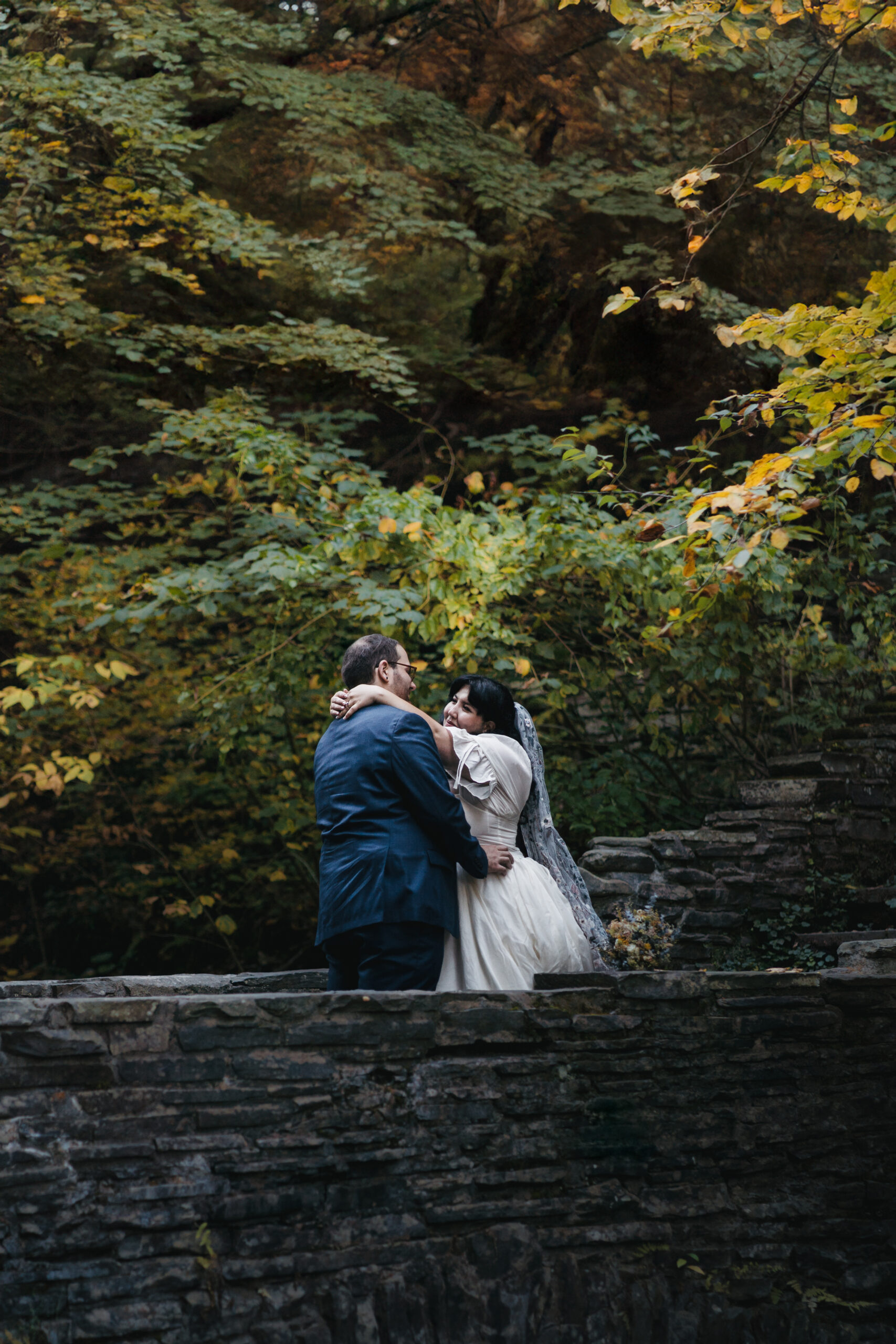 Romantic portraits inside Watkins Glen Gorge during a magical Watkins Glen elopement.