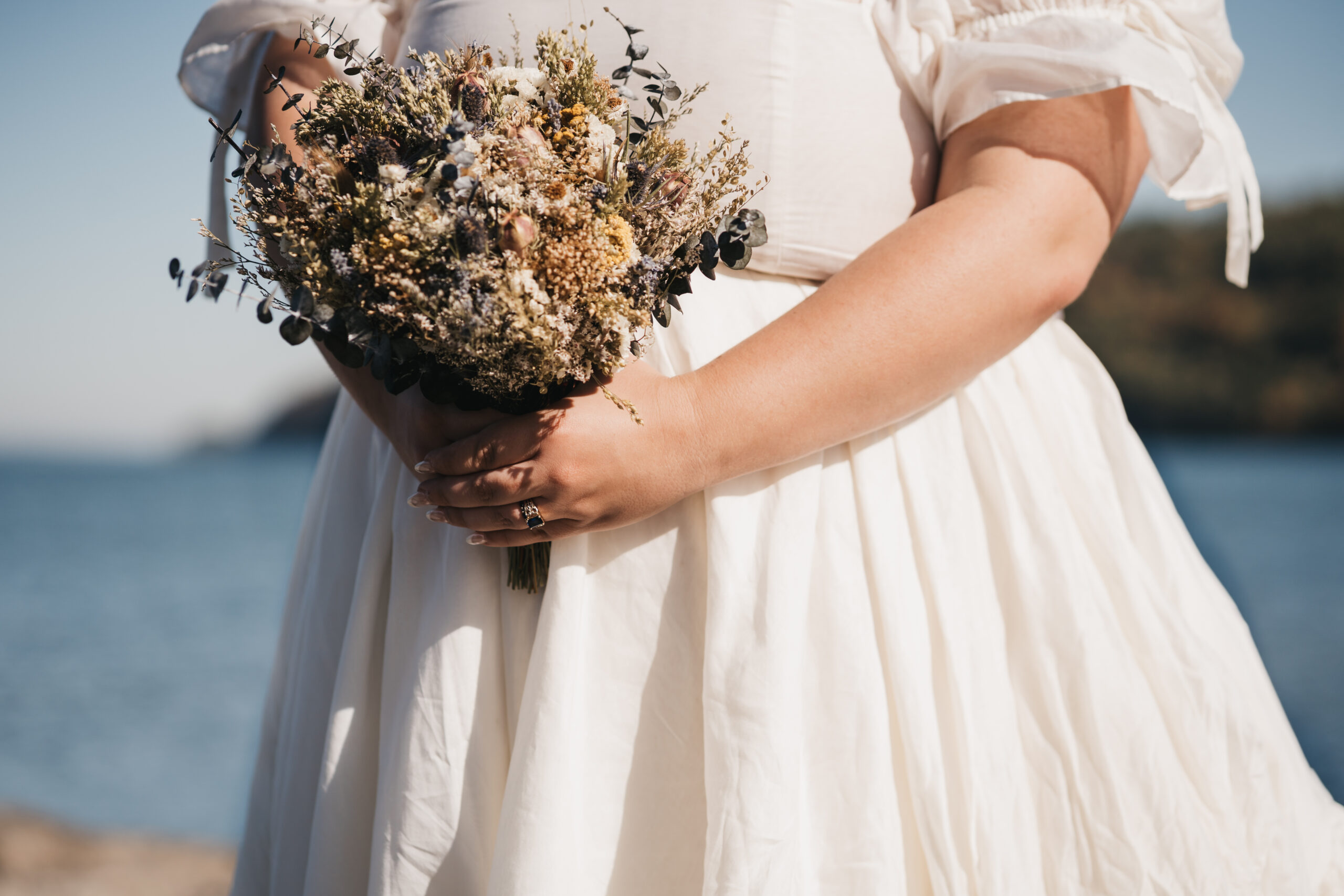 Detail shot of bride's dried floral bouquet.
