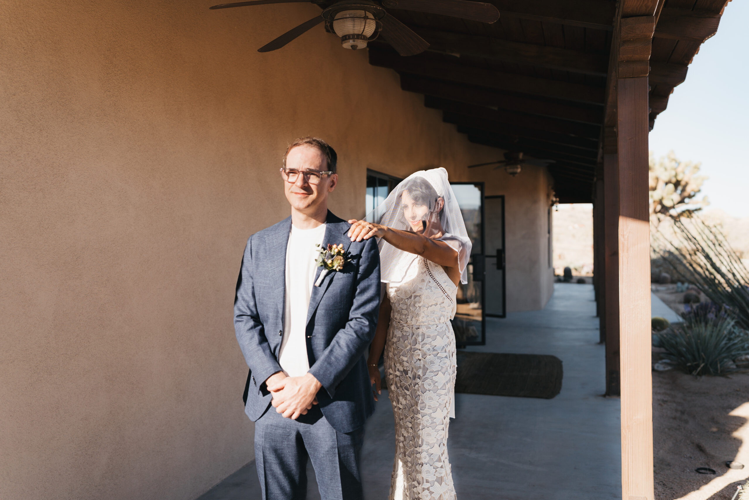 Romantic first look portrait from a desert Joshua Tree elopement.