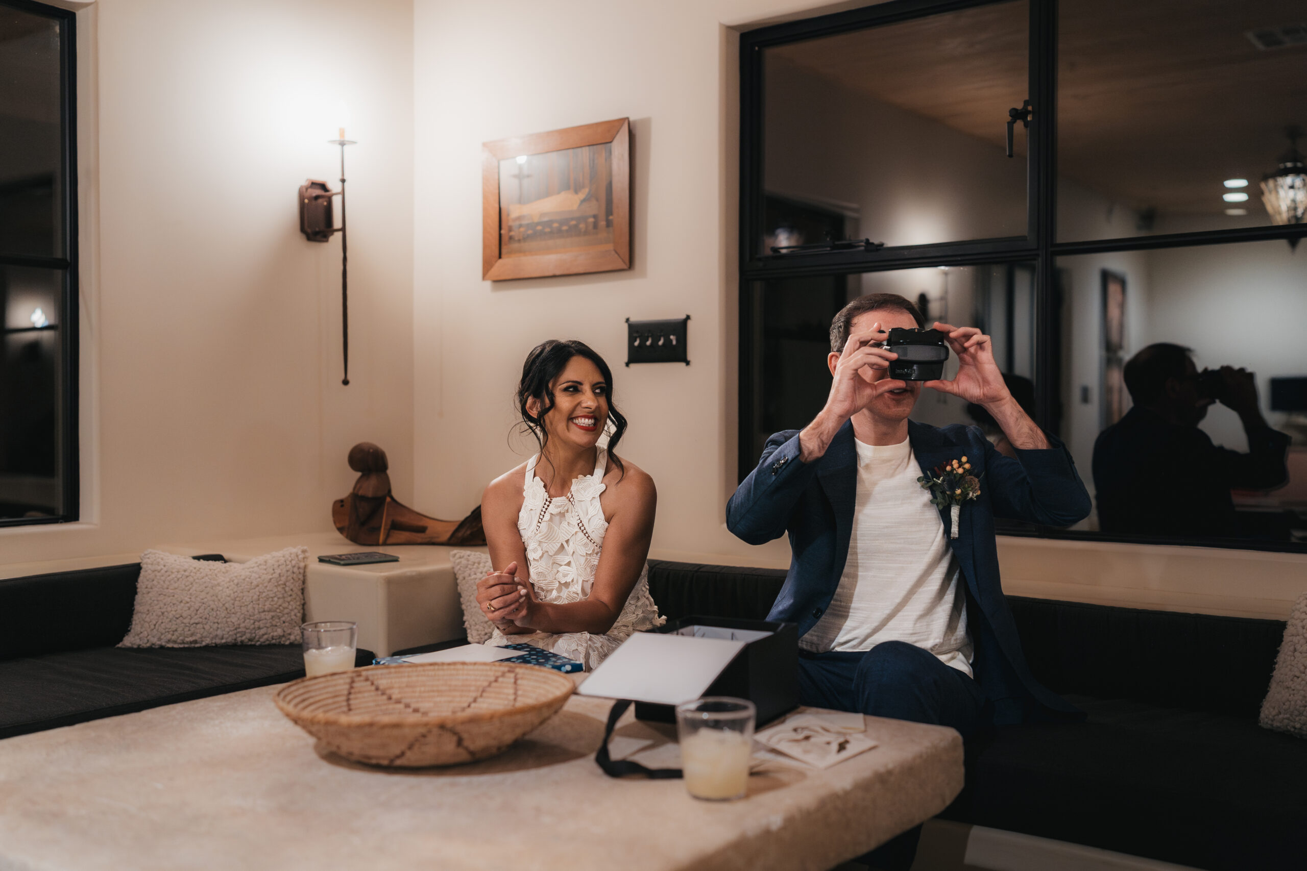 Couple exchanging wedding gifts after their Joshua Tree elopement.
