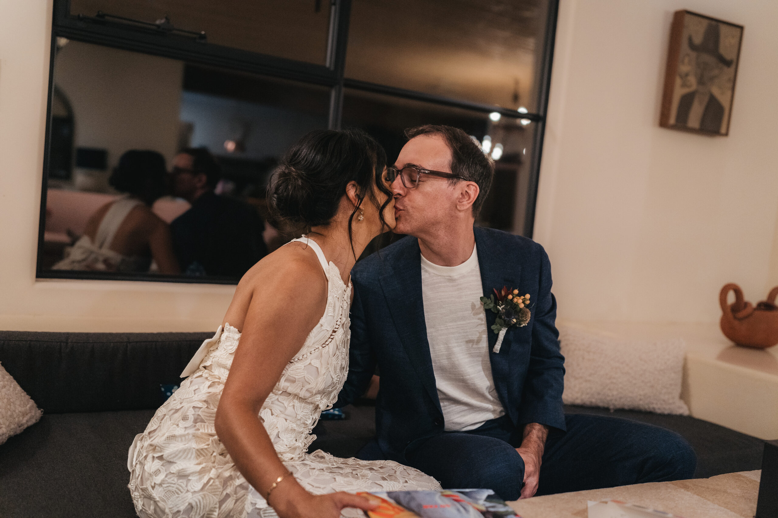 Bride and Groom sharing a kiss to end their wedding day.