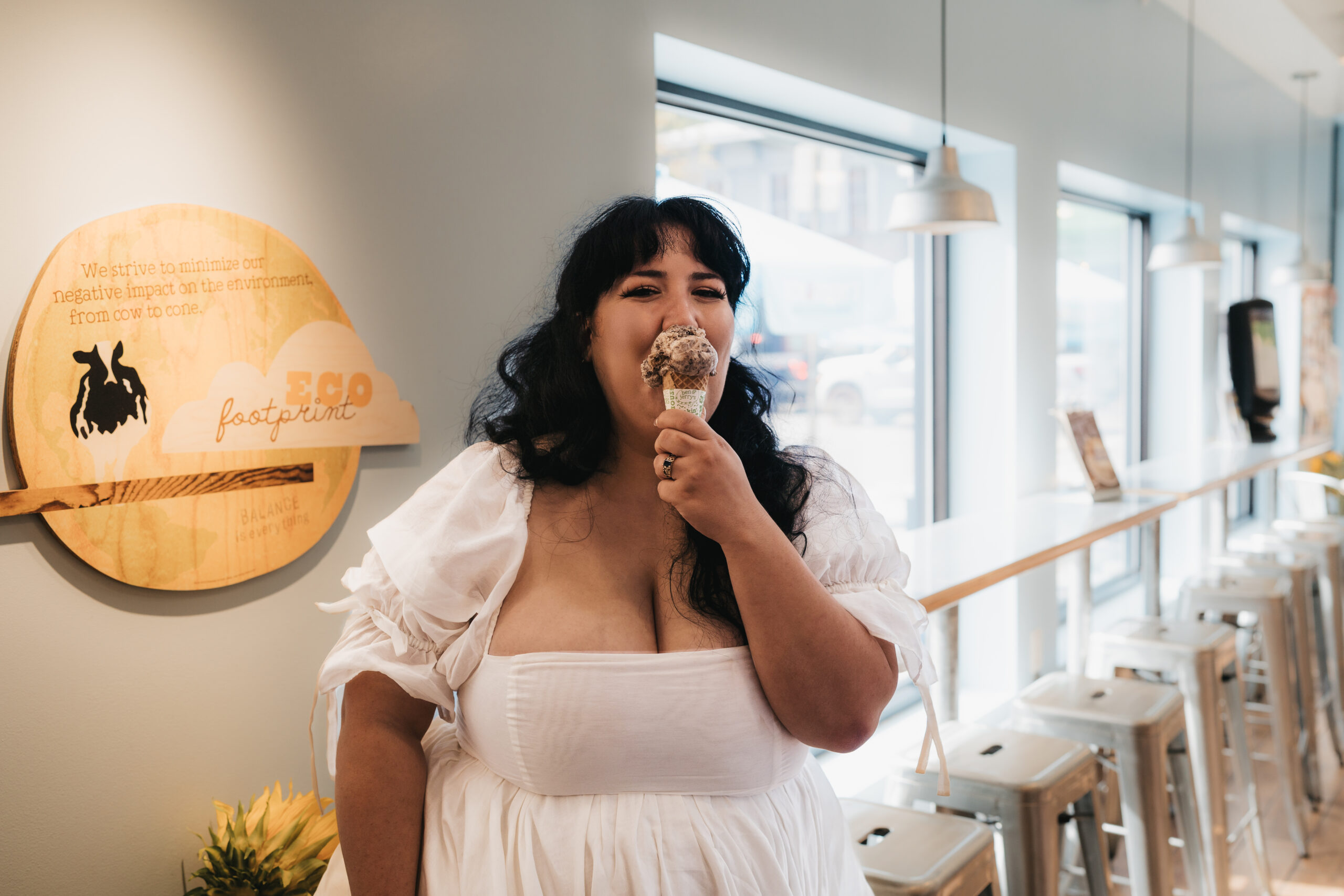 Bride enjoying Ben & Jerry's ice cream during her wedding day.