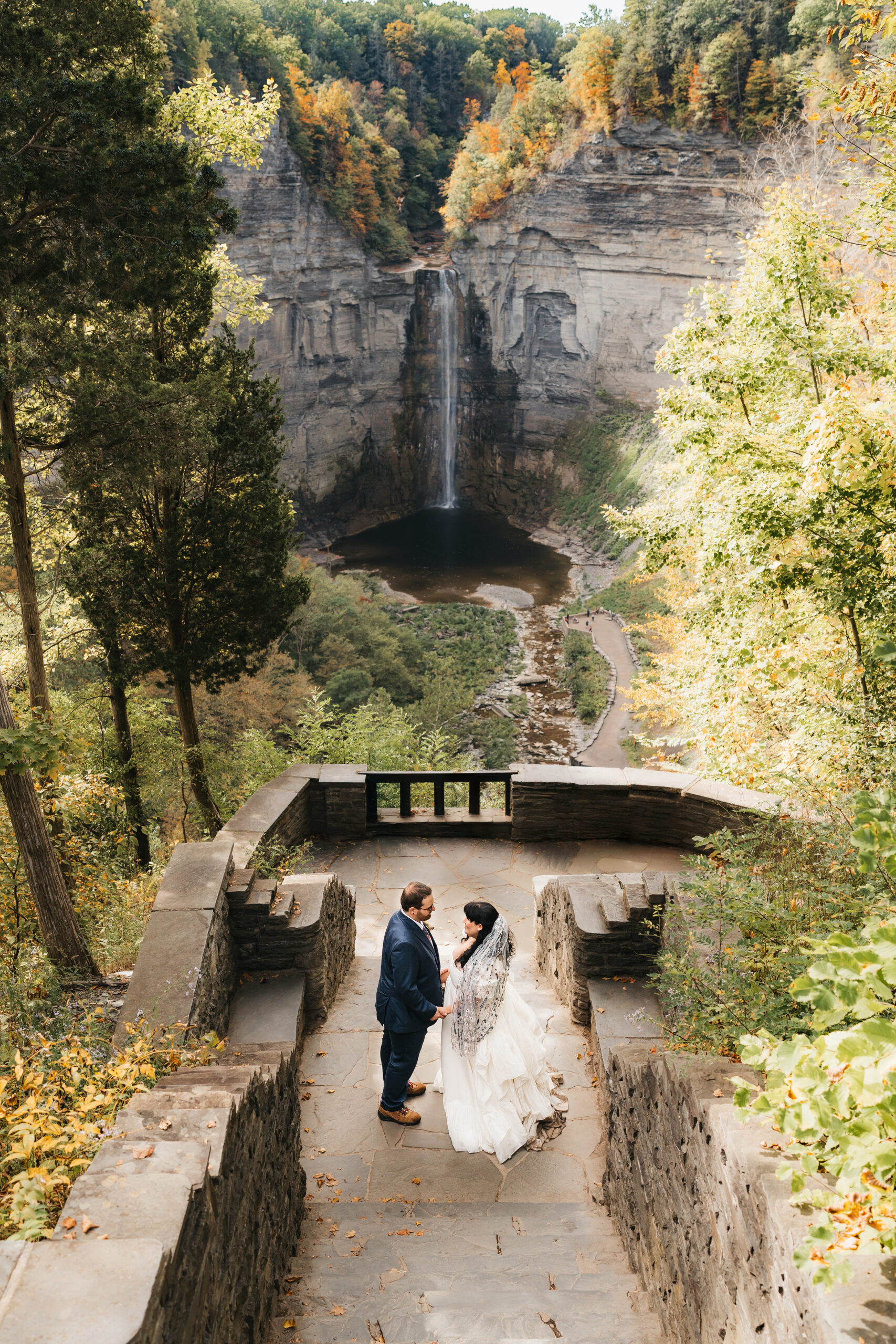 Romantic portraits at Taughannock Falls during a Finger Lakes Watkins Glen elopement.