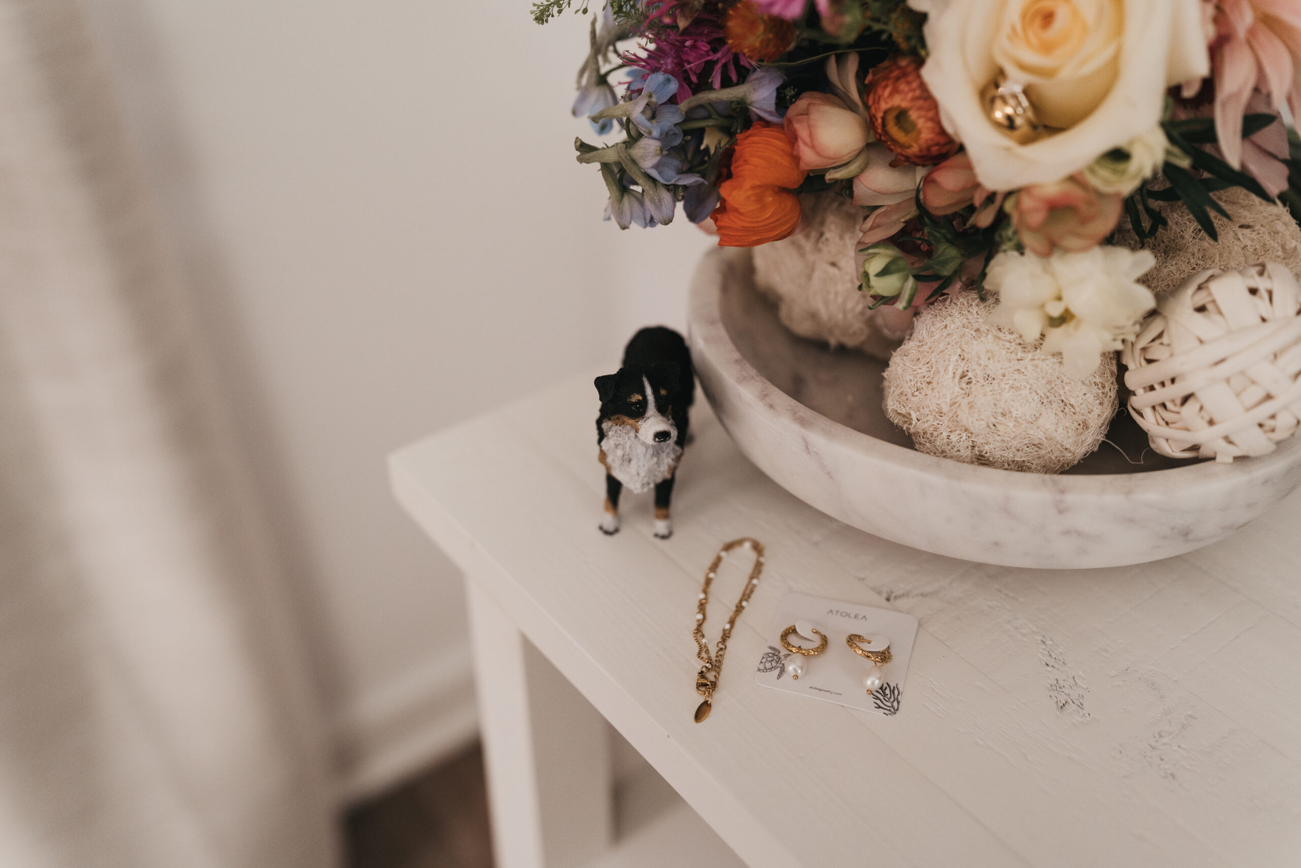 Mini dog figurine included in wedding details for an Acadia National Park Elopement.