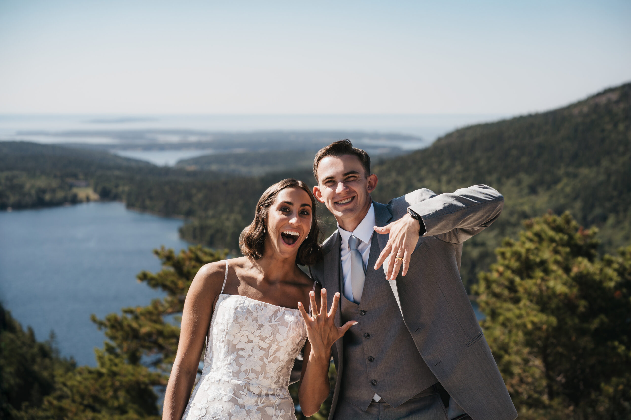 Bride and groom celebrating at North Bubble after their Sunrise Acadia Elopement.
