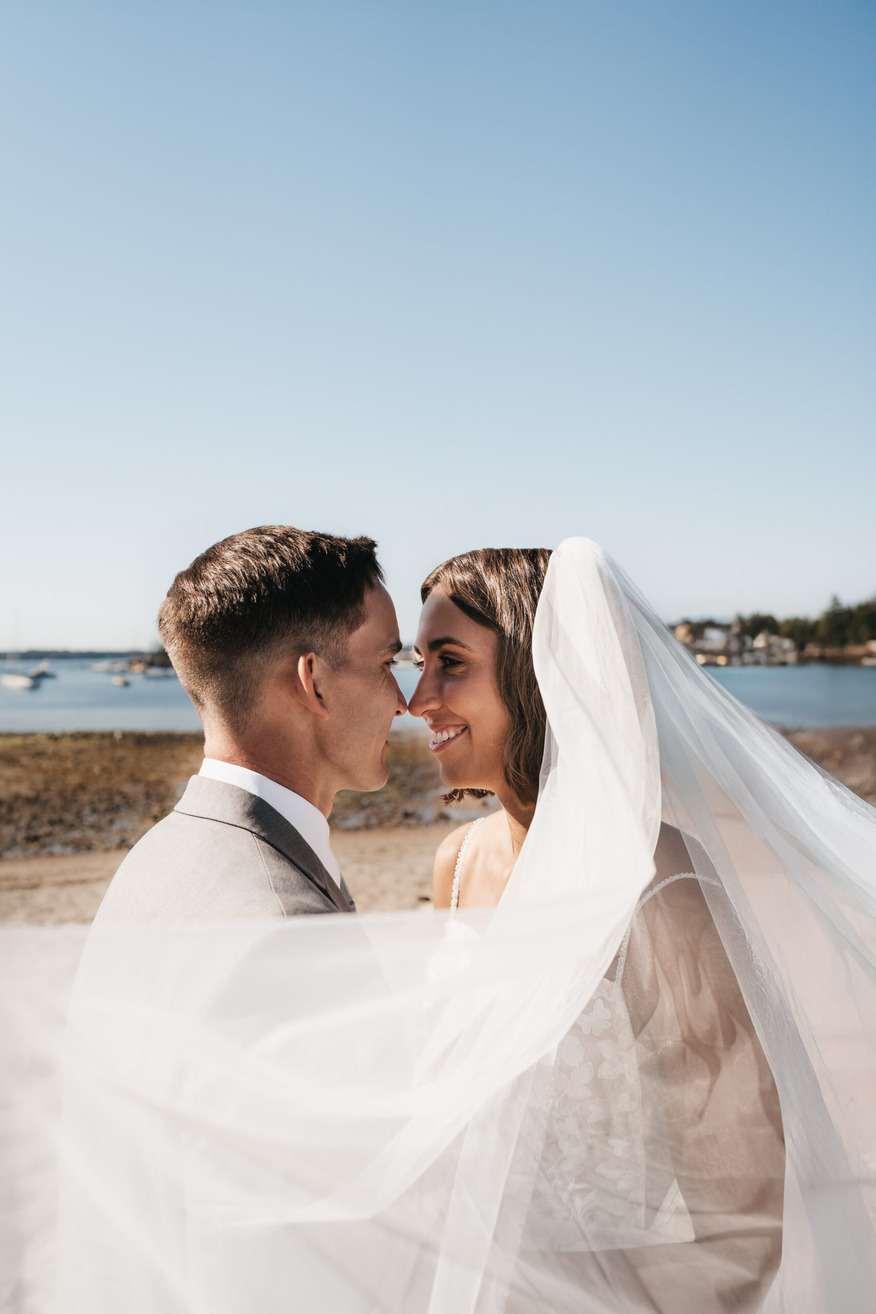 Couple enjoying the Maine coastline during a Sunrise Acadia Elopement.