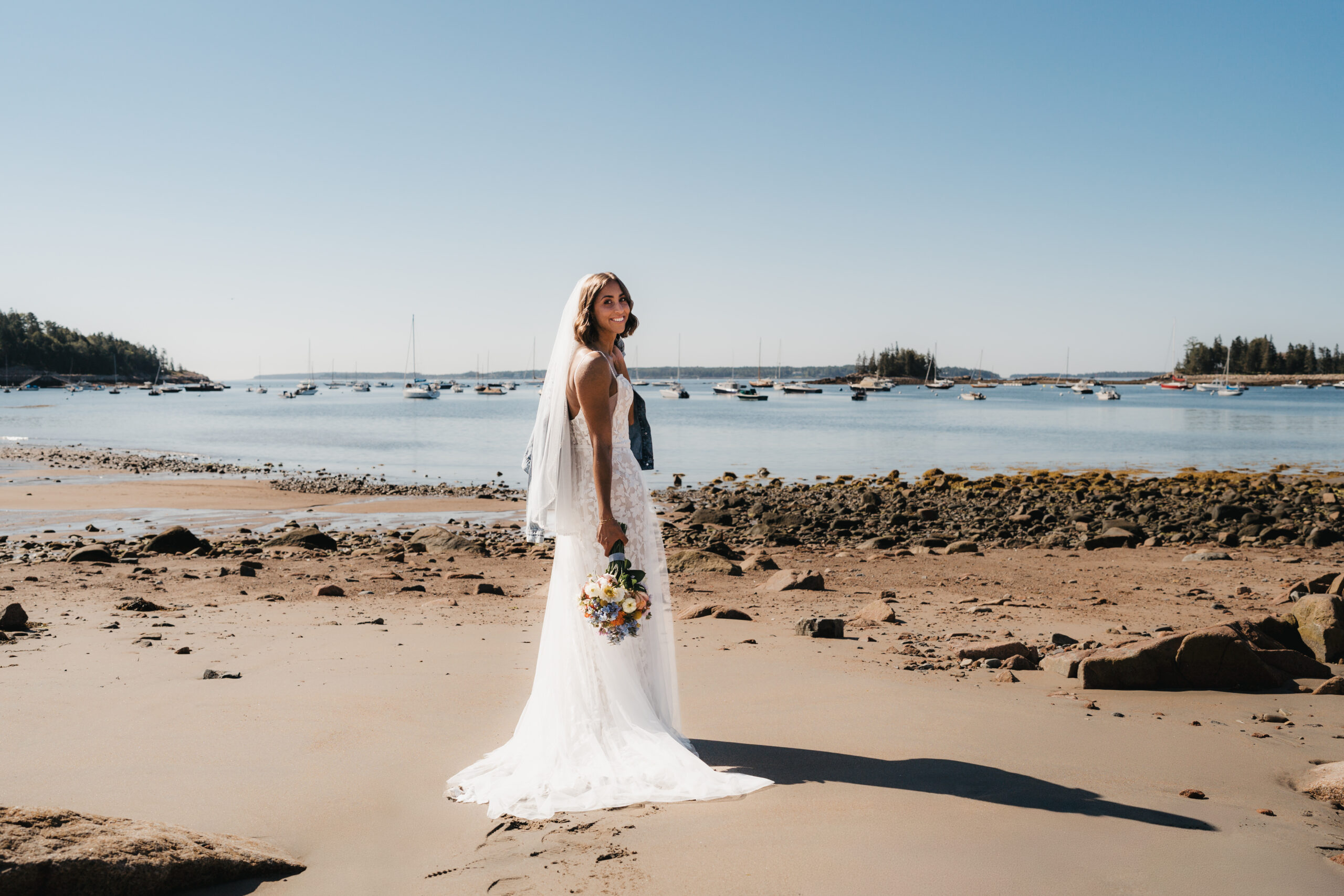 Bride portraits along Seal Beach Harbor in Acadia.